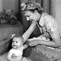 Woman-bathing-a-baby-1948-Science & Society Picture Library_Getty Images.jpg